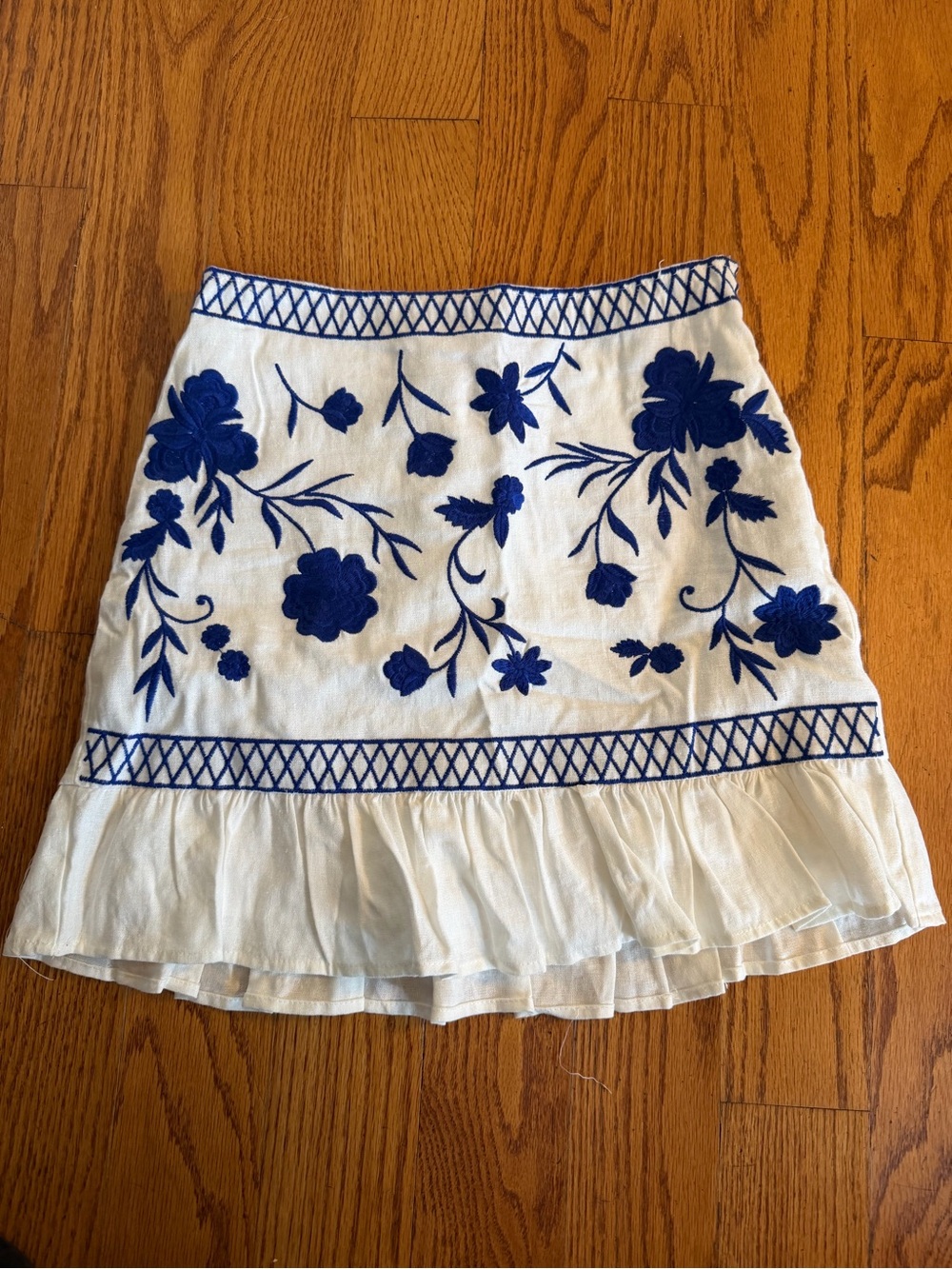 Francesca's Collections White Mini Skirt with Blue Floral Embroidery